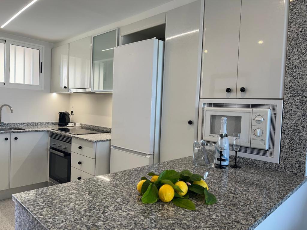 Apartamento 1ª Linea De Playa - Con Piscina Y Parking Playa de Gandia Dış mekan fotoğraf